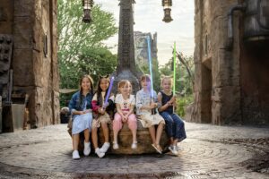 kids posing with lightsabers at Star Wars: Galaxy's Edge
