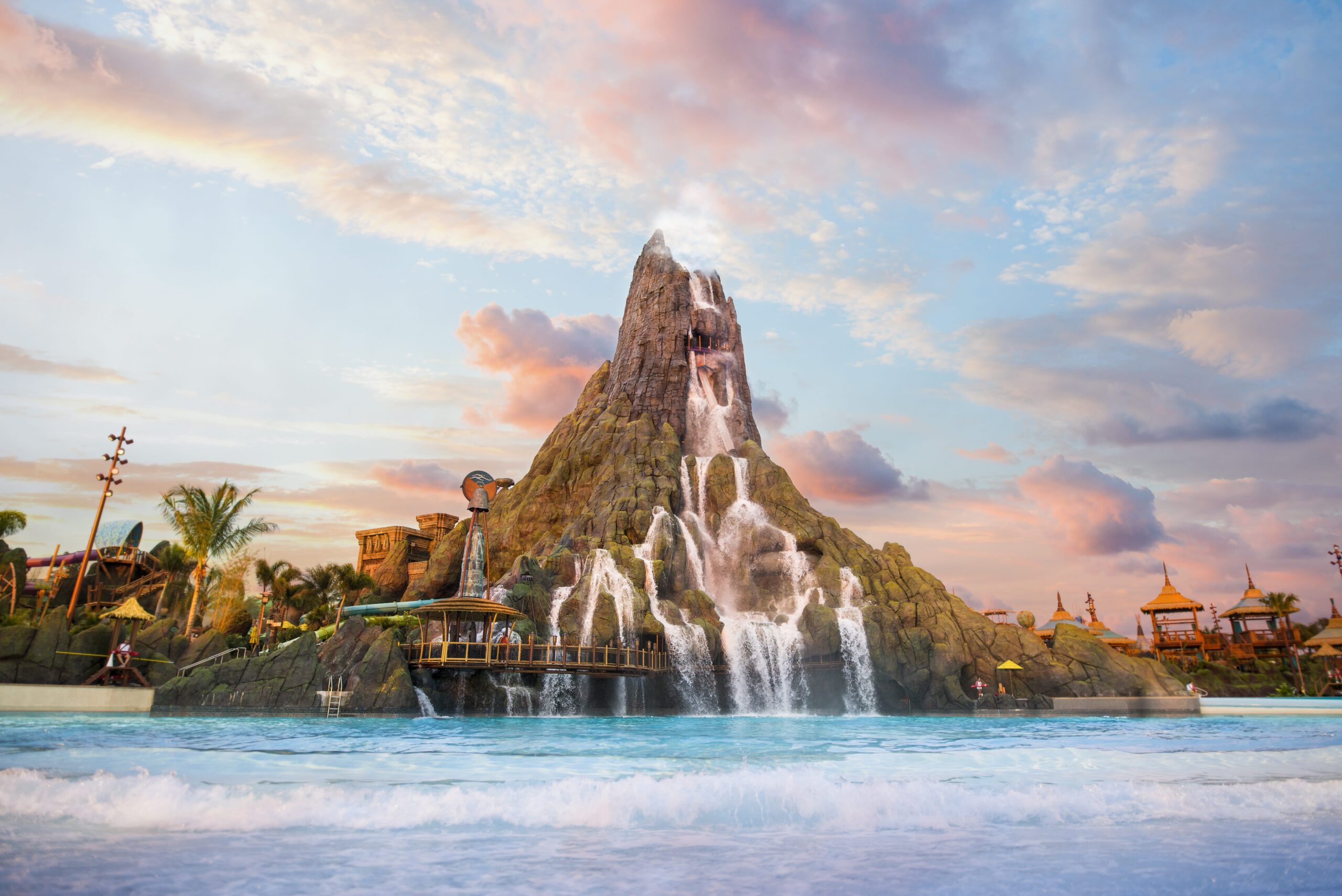 a wideshot of the titular volcano centerpiece at volcano bay water theme park