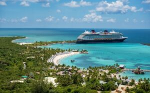 wideshot of the disney wish cruise ship docked at disney's castaway cay island