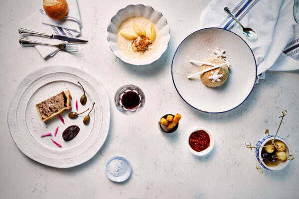 a spread of dishes on a table offered by princess cruises while on board
