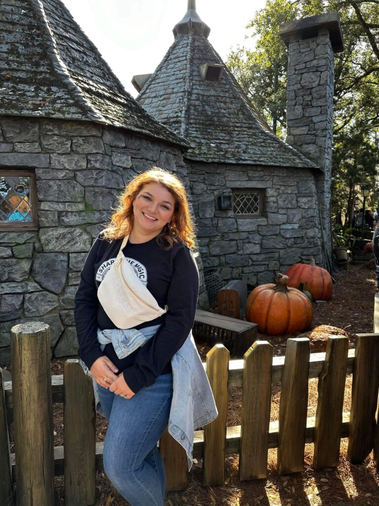 Chelsea Williams standing in front of Hagrid's Hut at Universal Studios Orlando