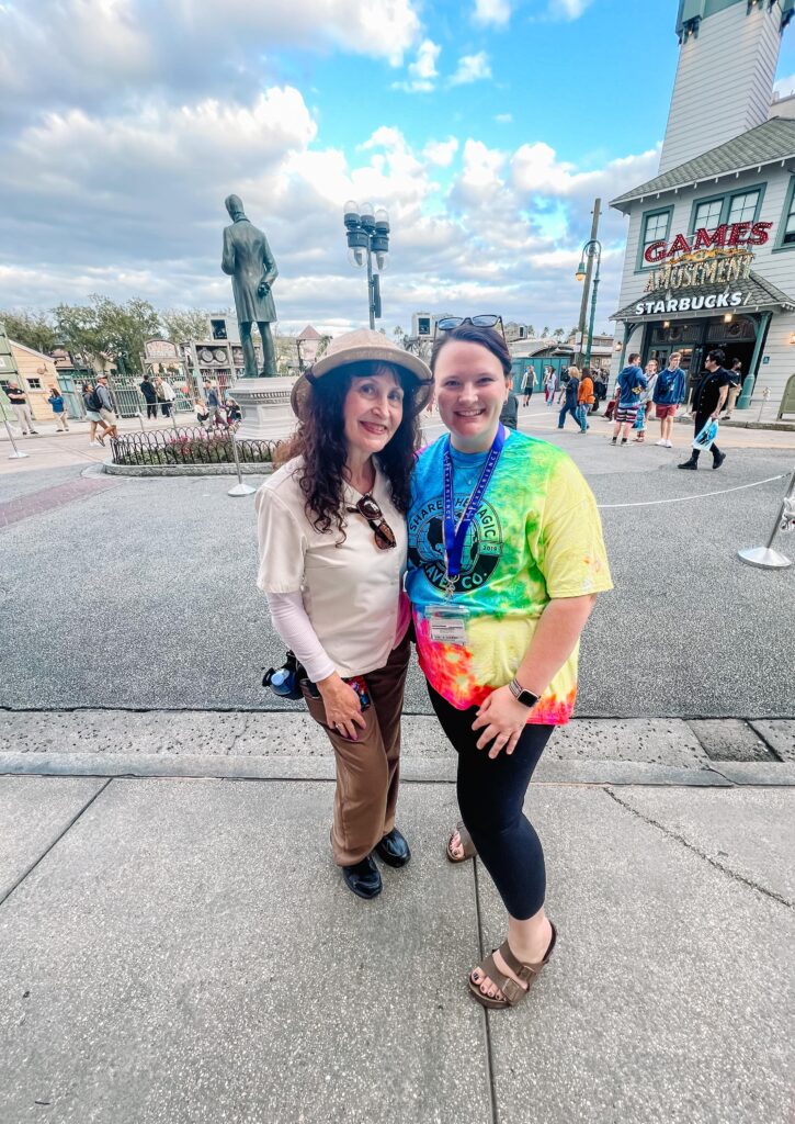 Lauren Kelley posing for a photo with a Universal Orlando Resort VIP Tour Guide
